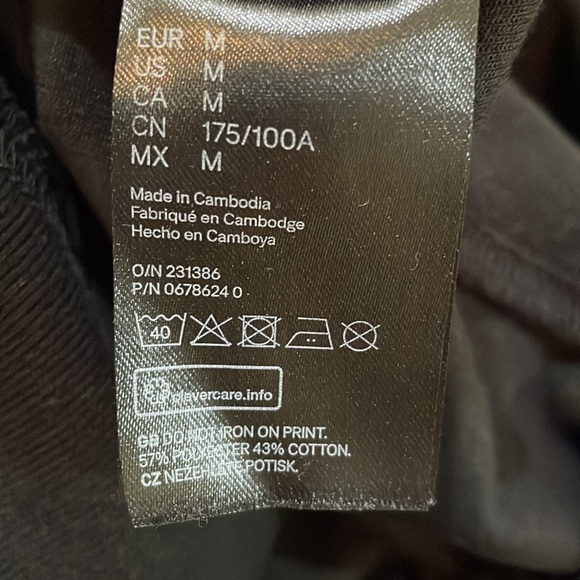 A Preowned H & M Woman size medium black and white Sweatshirt Hoodie with flower - Picture 12 of 12